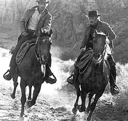 Paul Newman as Butch Cassidy and Robert Redford as the Sundance Kid